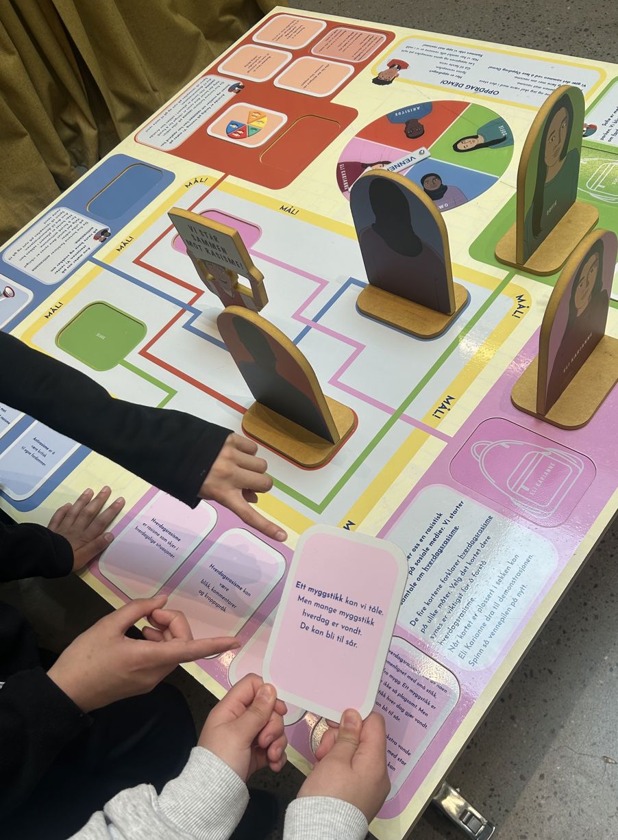 a child's hands holding scissors